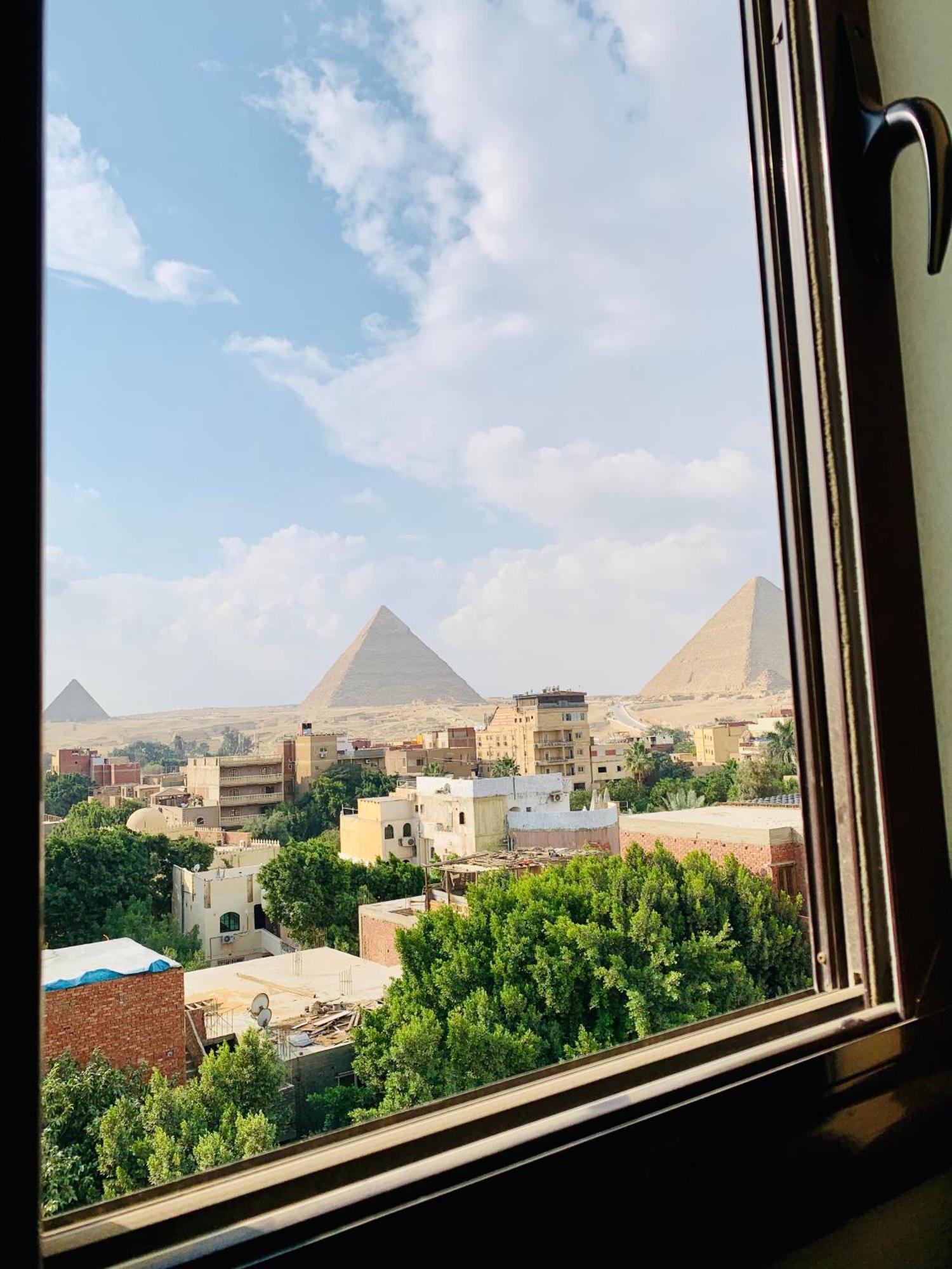 Loay Pyramids View Apartment Kairo Bagian luar foto